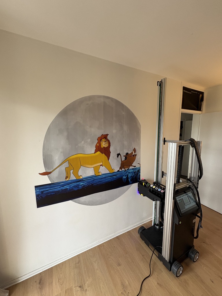 Lion King mural being printed on wall